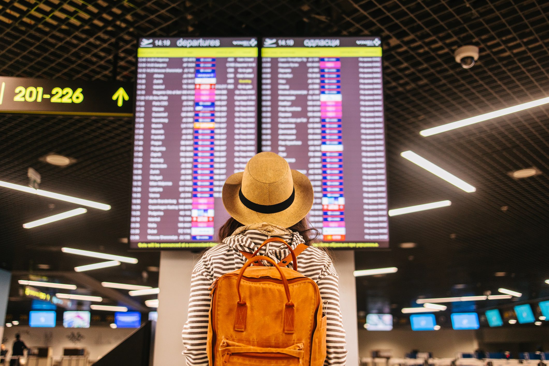 woman in airport after professional transfer