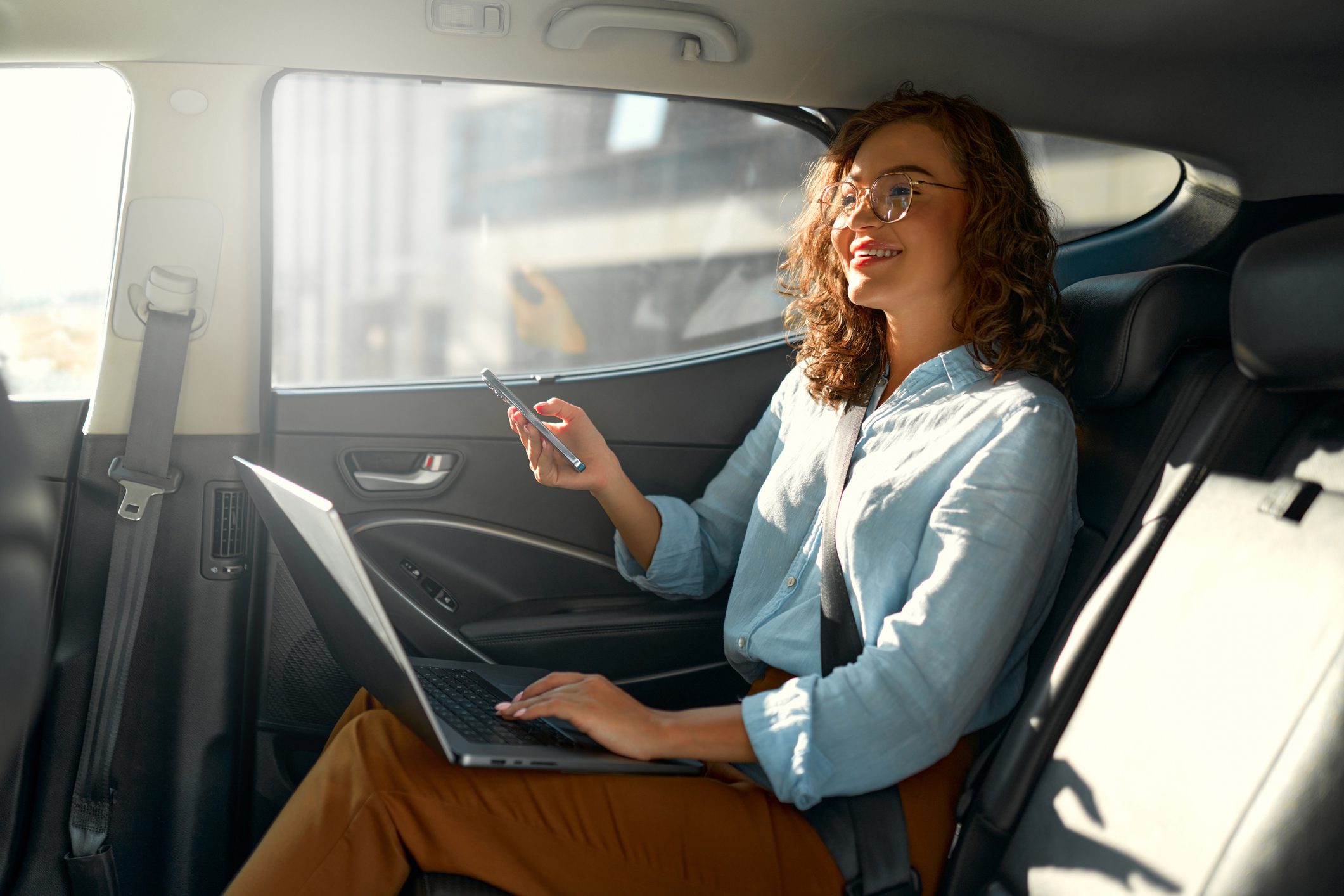 taxi passenger enjoying sustainable travel